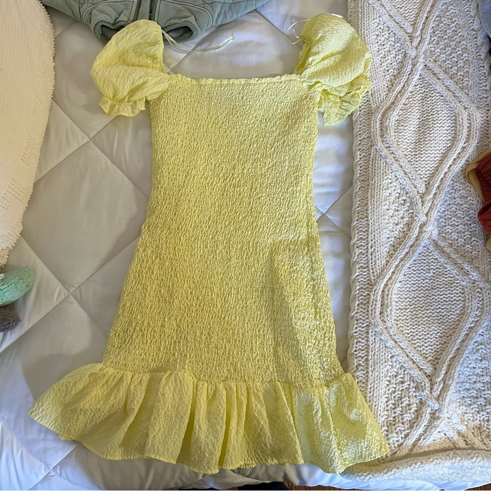 Fitted yellow mini dress